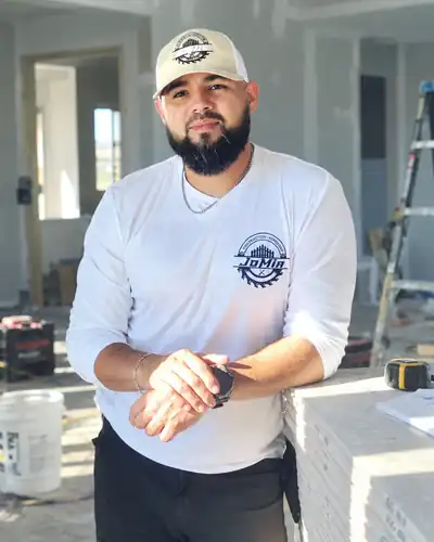 Jeremiah Montelongo, Owner / Operator of JoMia Construction LLC, on a job site